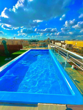 رويا�� جروب اربد Royal Group Hotel